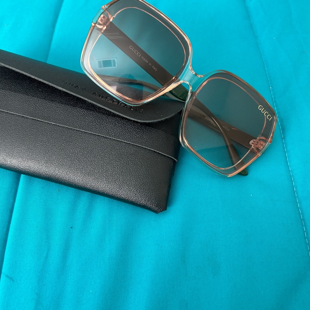 Fashion sunnies! Pink tint with red and green stripe on sides!